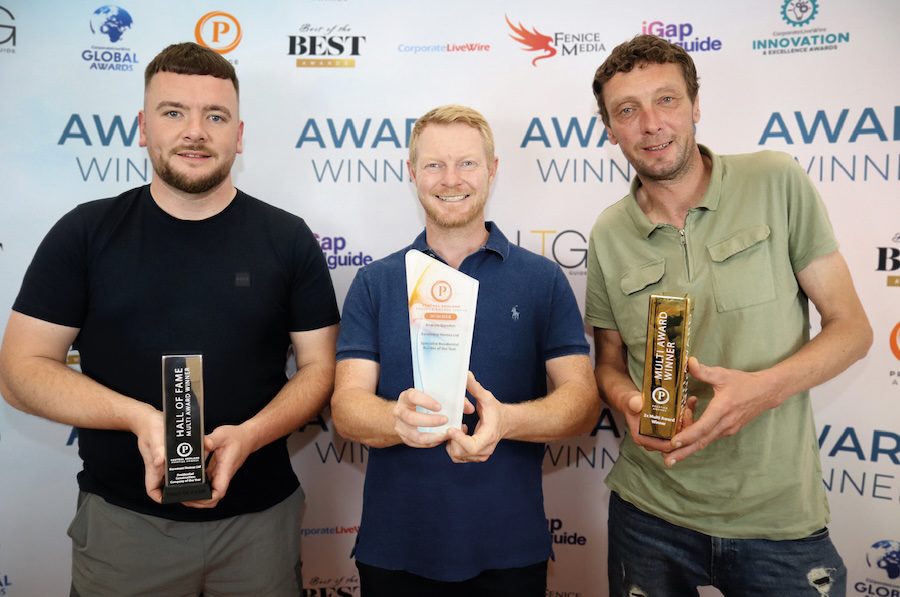 Andrew and team collecting builder of year award